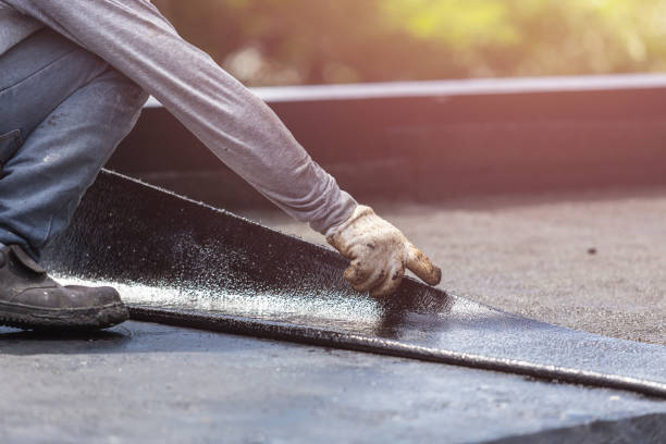 Professional Waterproofing technician working in Severna Park, MD